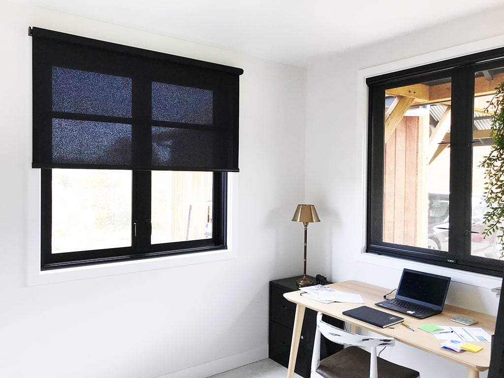 Black roller blinds with light filtering fabric